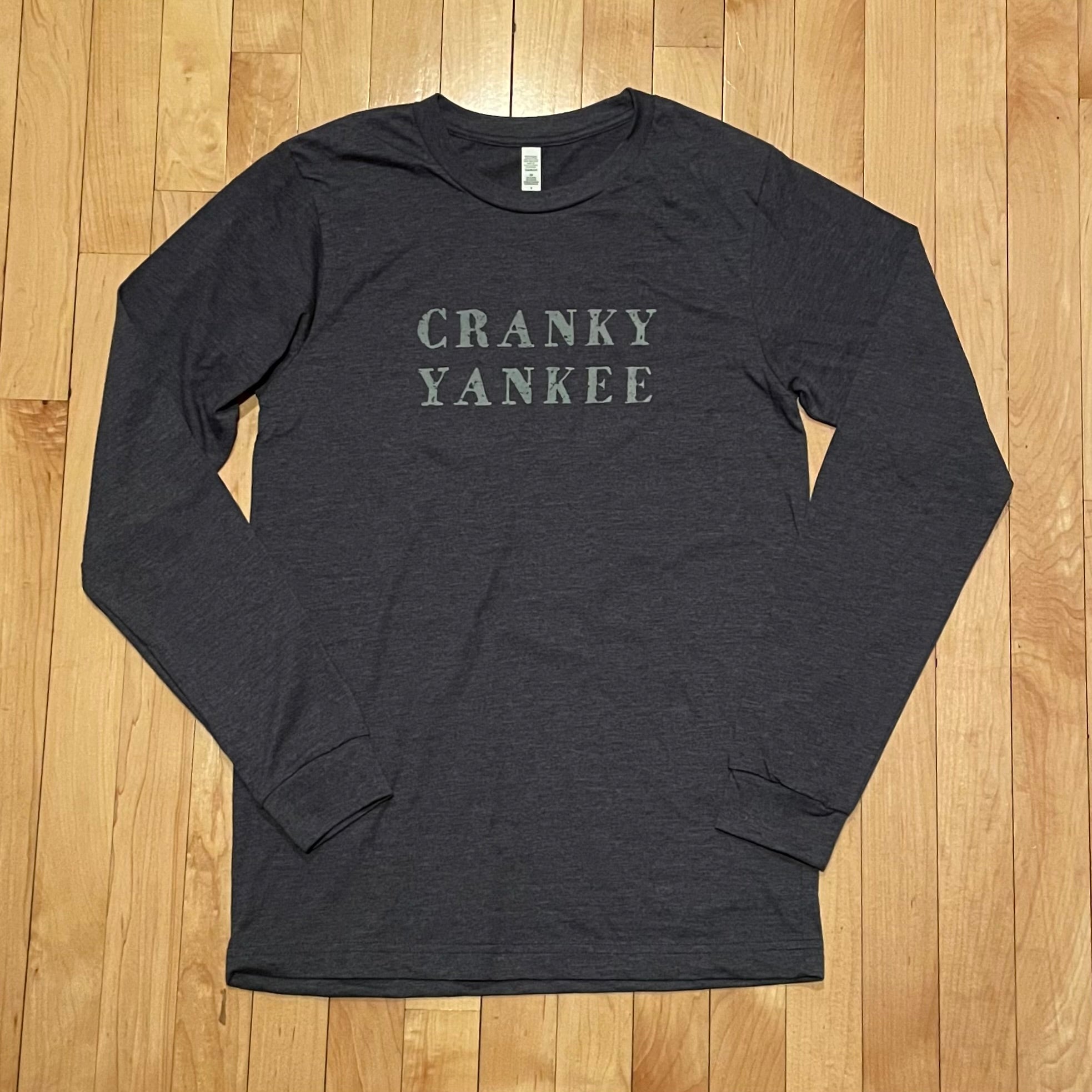 Yankee shirt is a Large and it fits amazing. Black album shirt that has